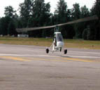 Gyrocopter coming in for a landing.